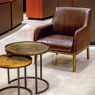 Close up picture of a chair and coffee table Close up picture of a chair and coffee table